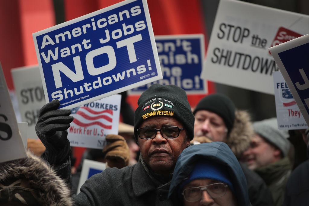 Government workers protest the shutdown during a demonstration in Chicago