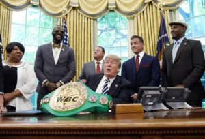 US President Donald Trump speaks after granting posthumous pardon to former heavyweight champion Jack Johnson in the Oval Office of the White House