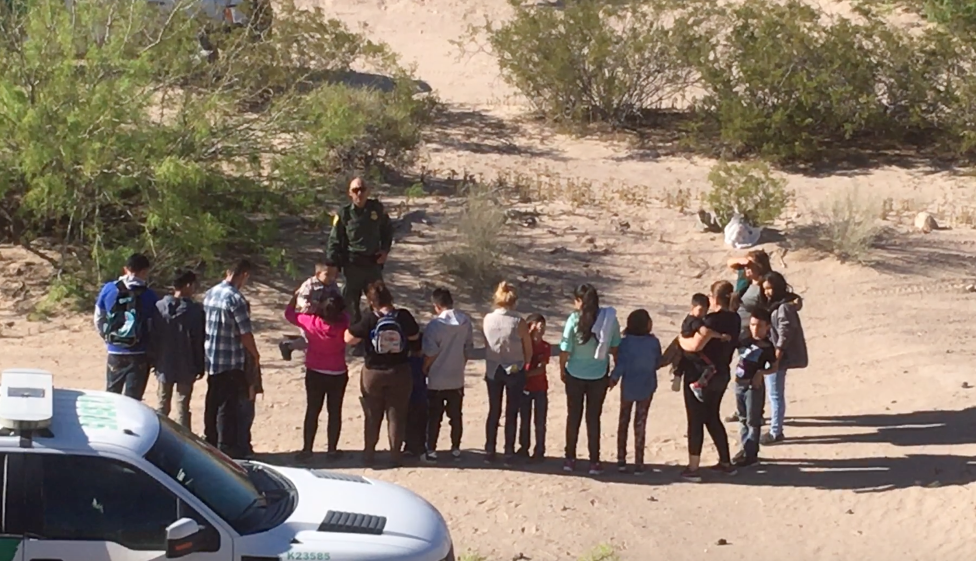 Migrants who have just crossed the border from Mexico into New Mexico near the UCP camp begin the process of requesting asylum.