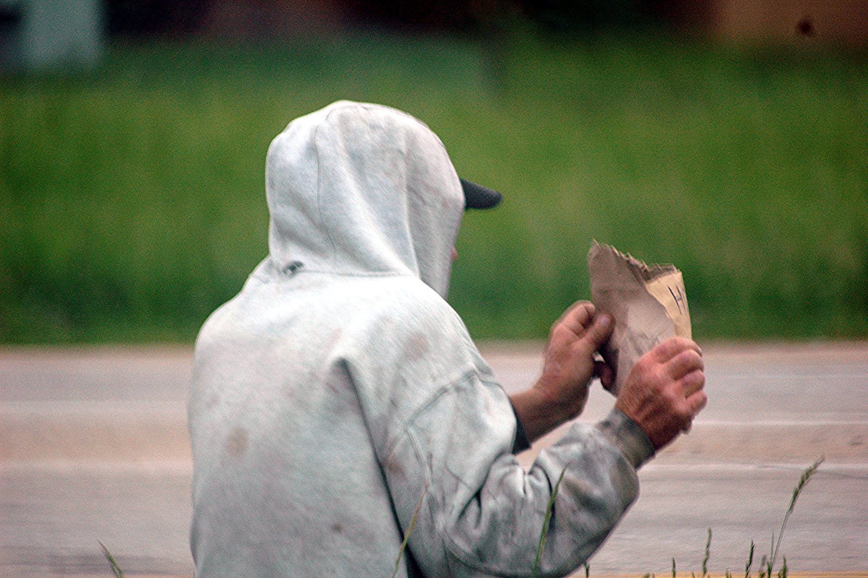 Picture of homeless person near roadway