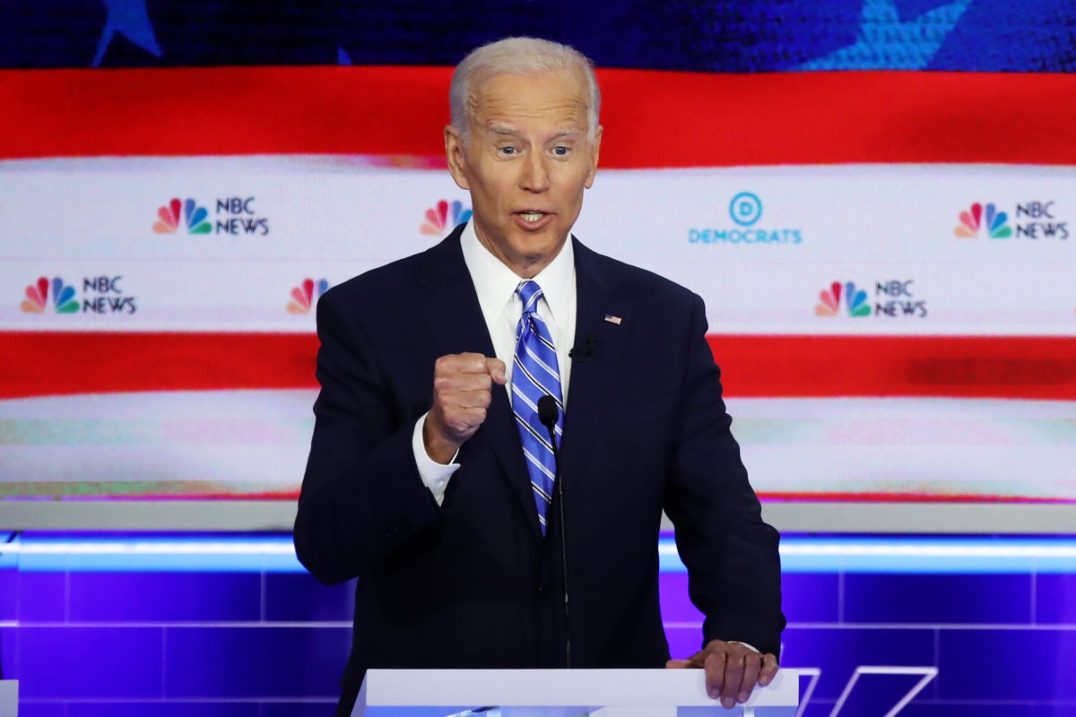 Joe Biden debating on stage