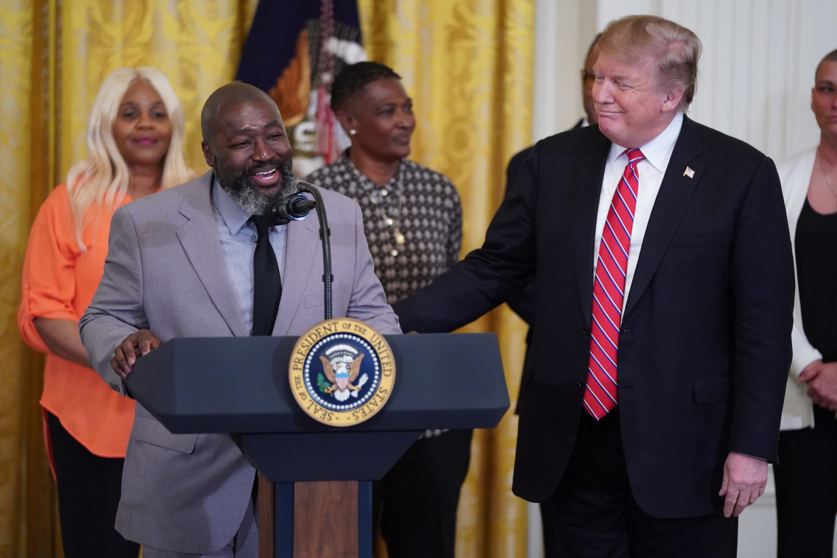 Photo of Matthew Charles with President Trump at First Step Act event