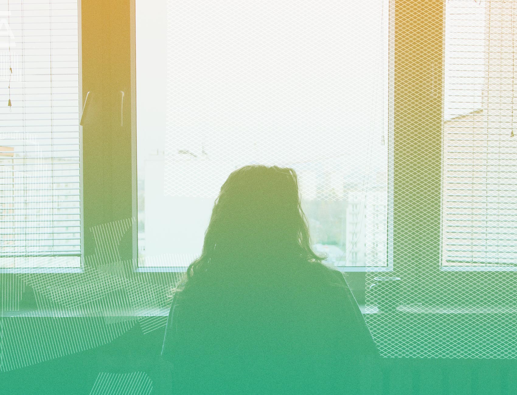 Photo of woman at window.