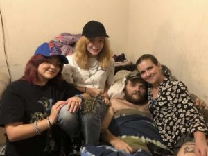 Joshua Lee Smith with his fiancée and two daughters.