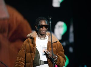 Rapper Young Thug onstage at a concert