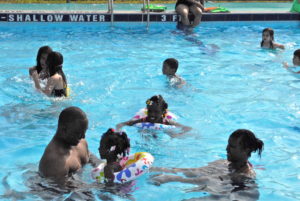 Children playing in a public pool