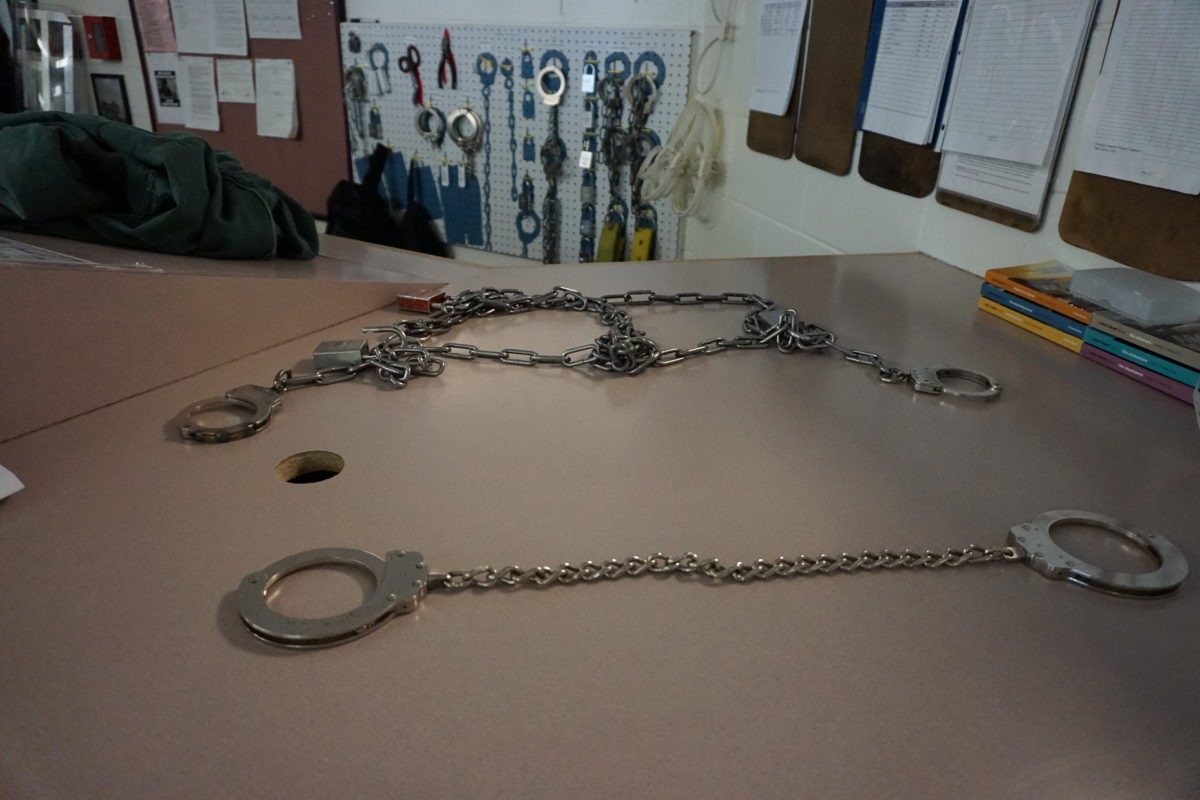 This photo shows the metal handcuffs CDOC uses to restrain people.