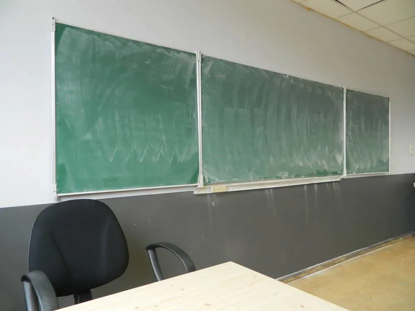 erased blackboard in classroom