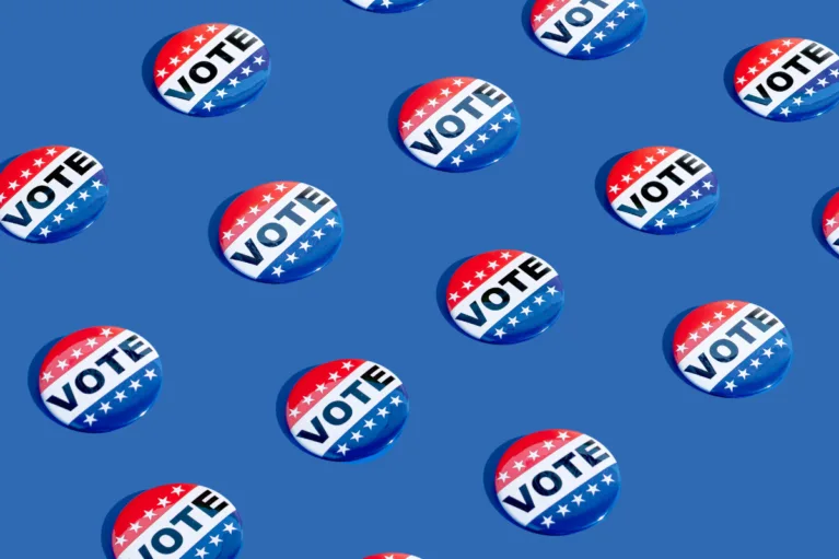 Vote stickers on blue background