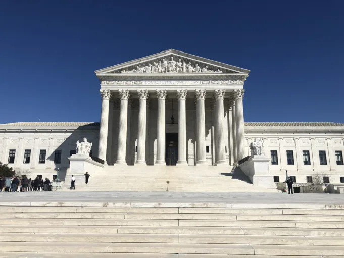 This photo shows the U.S. Supreme Court building in Washington, D.C. on a clear, sunny day.