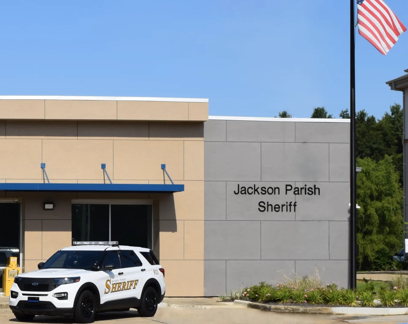 This photo shows a police cruiser SUV sitting outside the Jackson Parish Sheriff's Office headquarters.
