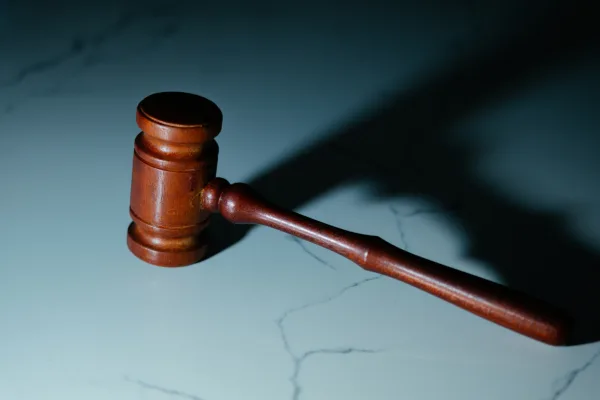 A gavel casting a shadow