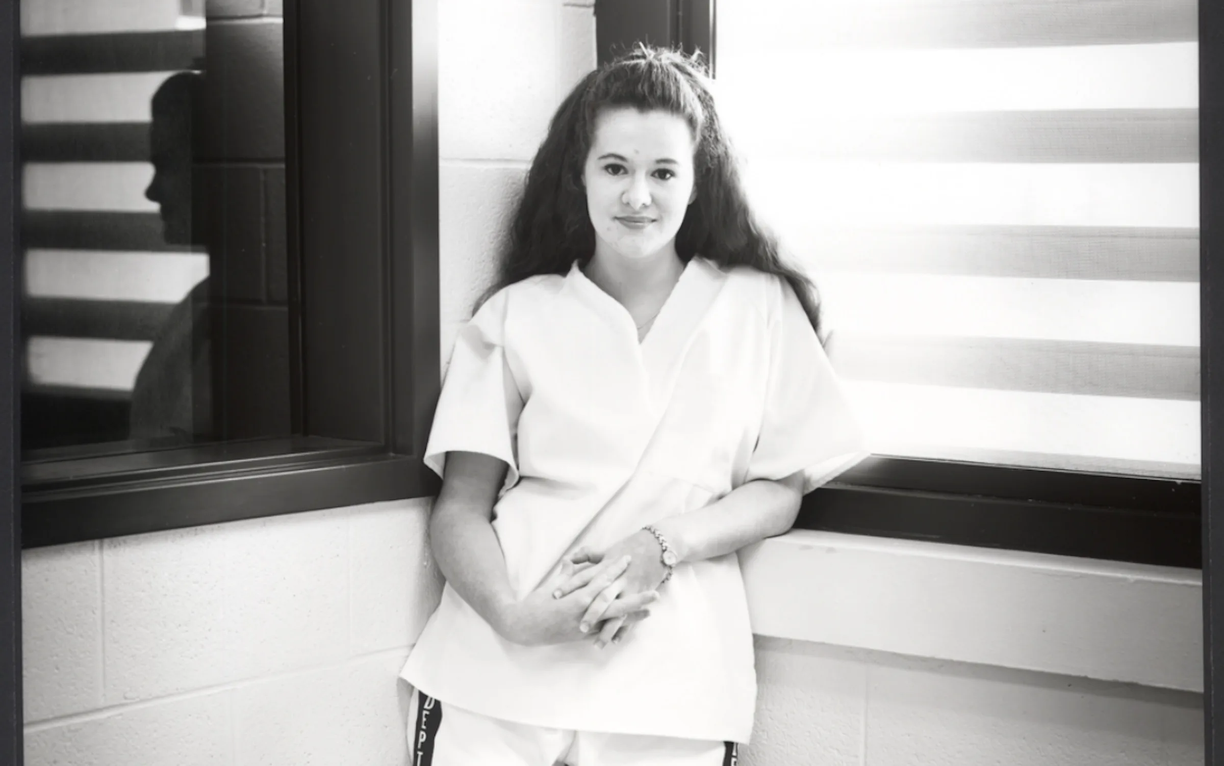 Christa Pike stands in prison in 1998.